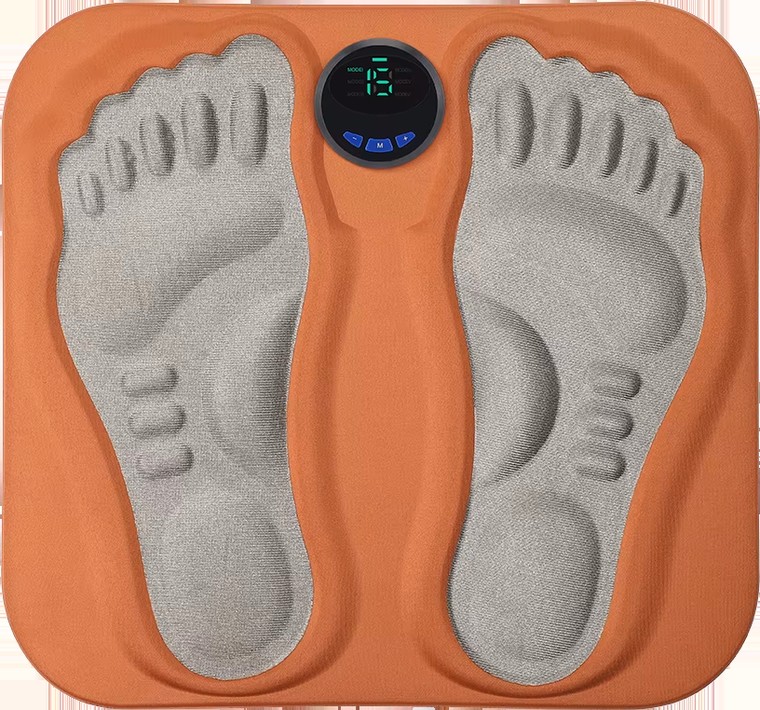 NeuroMat EMS foot mat, copper coloured pad with two grey footprints and a round control disc